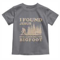 Retro I Found Jesus Still Looking Bigfoot Toddler T Shirt Vintage Sasquatch Believer Funny Christian Humor