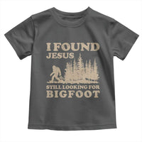 Retro I Found Jesus Still Looking Bigfoot Toddler T Shirt Vintage Sasquatch Believer Funny Christian Humor