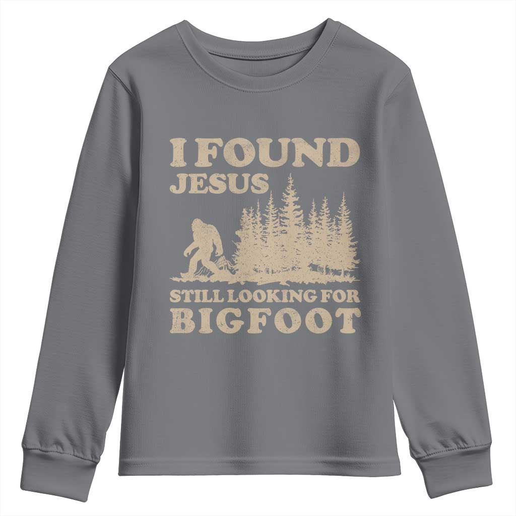 Retro I Found Jesus Still Looking Bigfoot Youth Sweatshirt Vintage Sasquatch Believer Funny Christian Humor