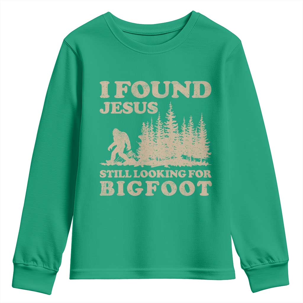 Retro I Found Jesus Still Looking Bigfoot Youth Sweatshirt Vintage Sasquatch Believer Funny Christian Humor
