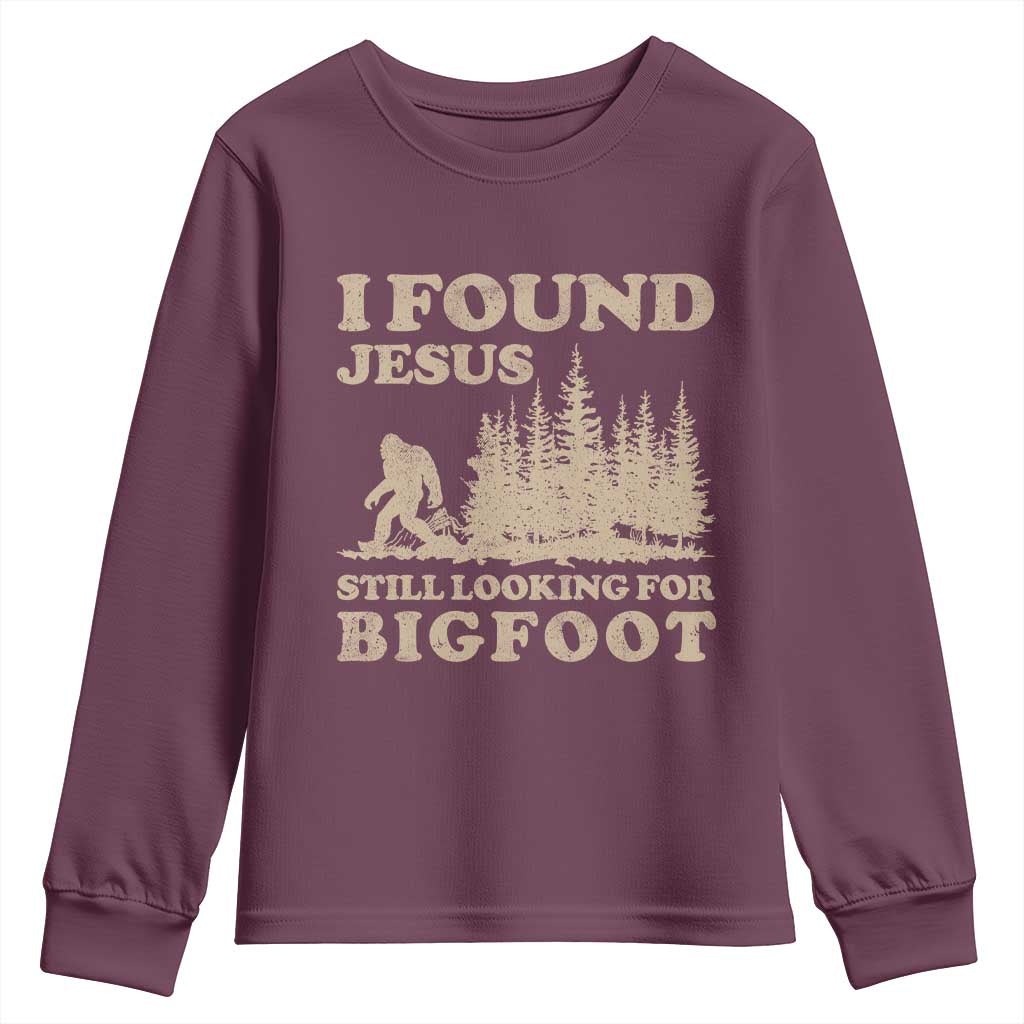 Retro I Found Jesus Still Looking Bigfoot Youth Sweatshirt Vintage Sasquatch Believer Funny Christian Humor