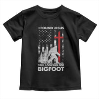 Retro I Found Jesus Still Looking For Bigfoot Toddler T Shirt Camouflage US American Flag Camo