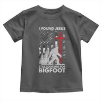Retro I Found Jesus Still Looking For Bigfoot Toddler T Shirt Camouflage US American Flag Camo