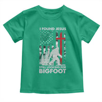 Retro I Found Jesus Still Looking For Bigfoot Toddler T Shirt Camouflage US American Flag Camo