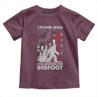 Retro I Found Jesus Still Looking For Bigfoot Toddler T Shirt Camouflage US American Flag Camo
