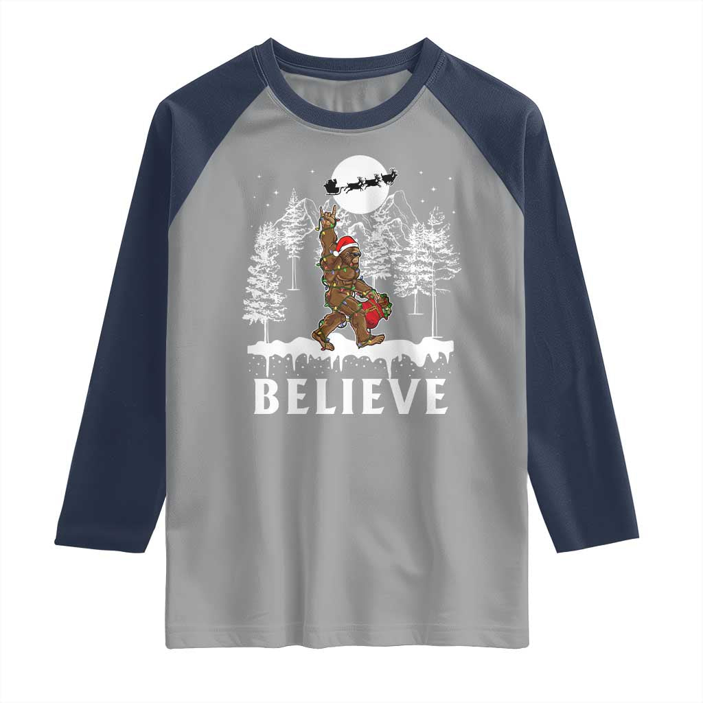 Bigfoot Christmas Tree Lights Raglan Shirt Believe Rock On Sasquatch Santa Hat