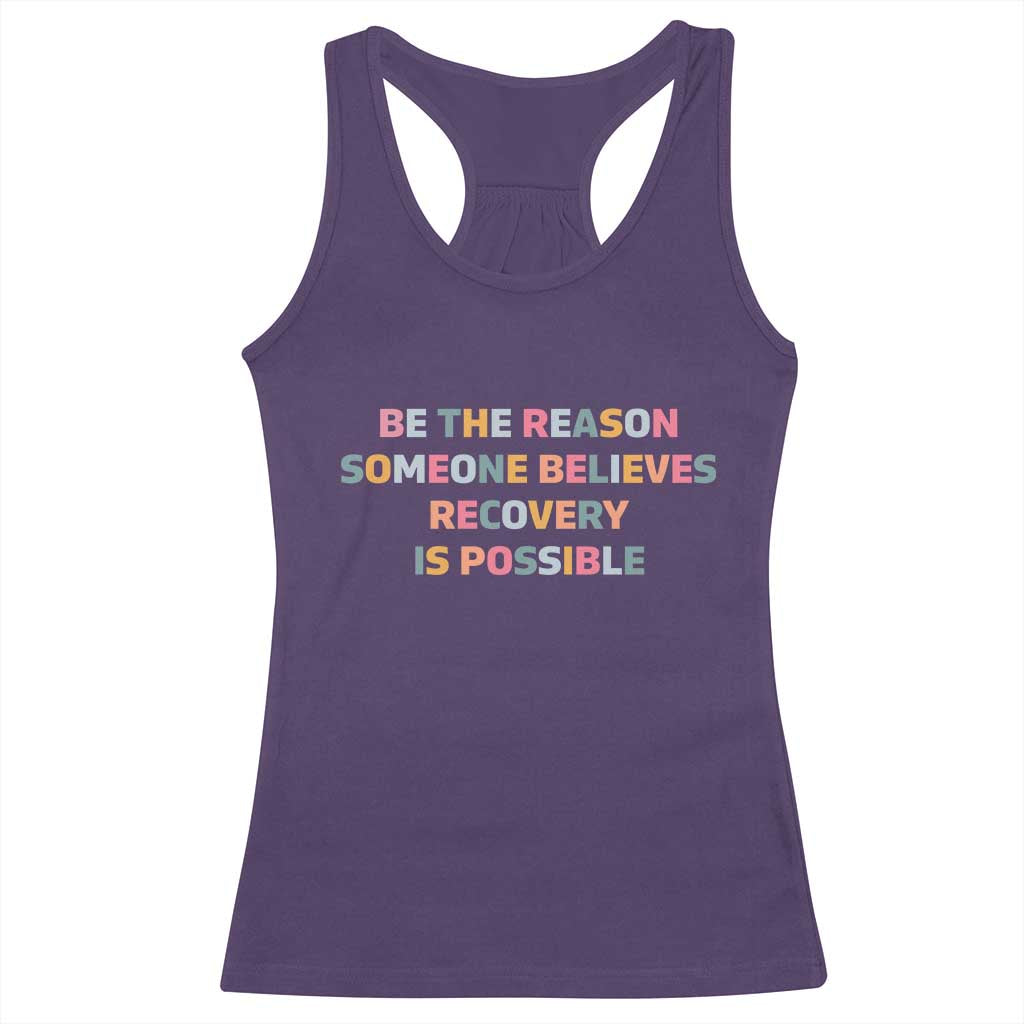 Be The Reason Someone Believes Recovery Is Possible Graphic Racerback Tank Top
