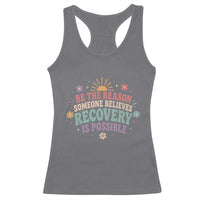 Be The Reason Someone Believes Recovery Is Possible Graphic Racerback Tank Top Groovy Graphic