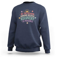 Be The Reason Someone Believes Recovery Is Possible Graphic Sweatshirt Groovy Graphic
