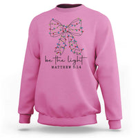 Be The Light Christmas Coquette Bow Sweatshirt Christian Religious Bible Verse - Wonder Print Shop