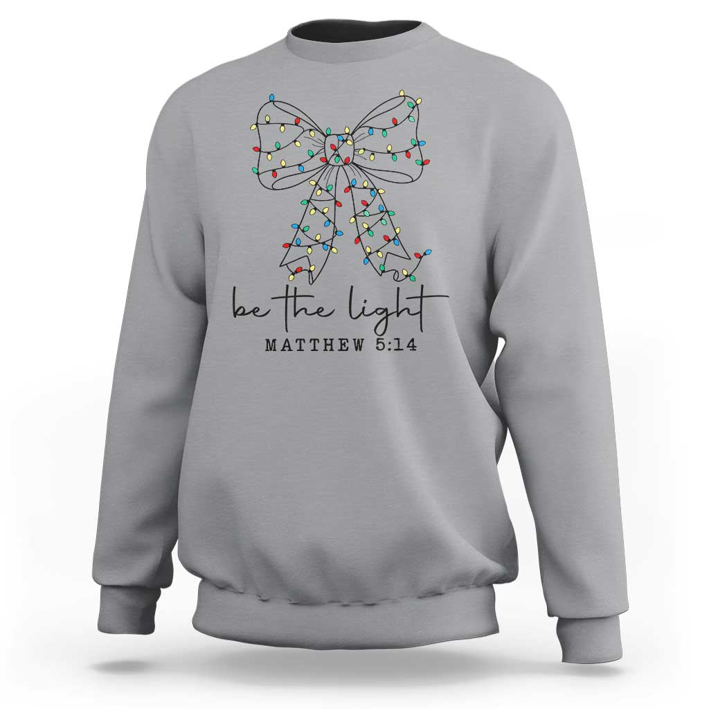Be The Light Christmas Coquette Bow Sweatshirt Christian Religious Bible Verse - Wonder Print Shop