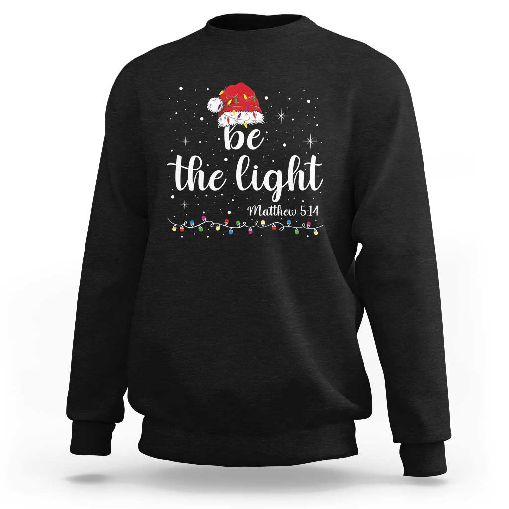 Be The Light Christmas Sweatshirt Christian Religious Bible Verse Santa Hat Pajama - Wonder Print Shop