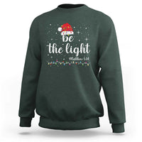 Be The Light Christmas Sweatshirt Christian Religious Bible Verse Santa Hat Pajama - Wonder Print Shop