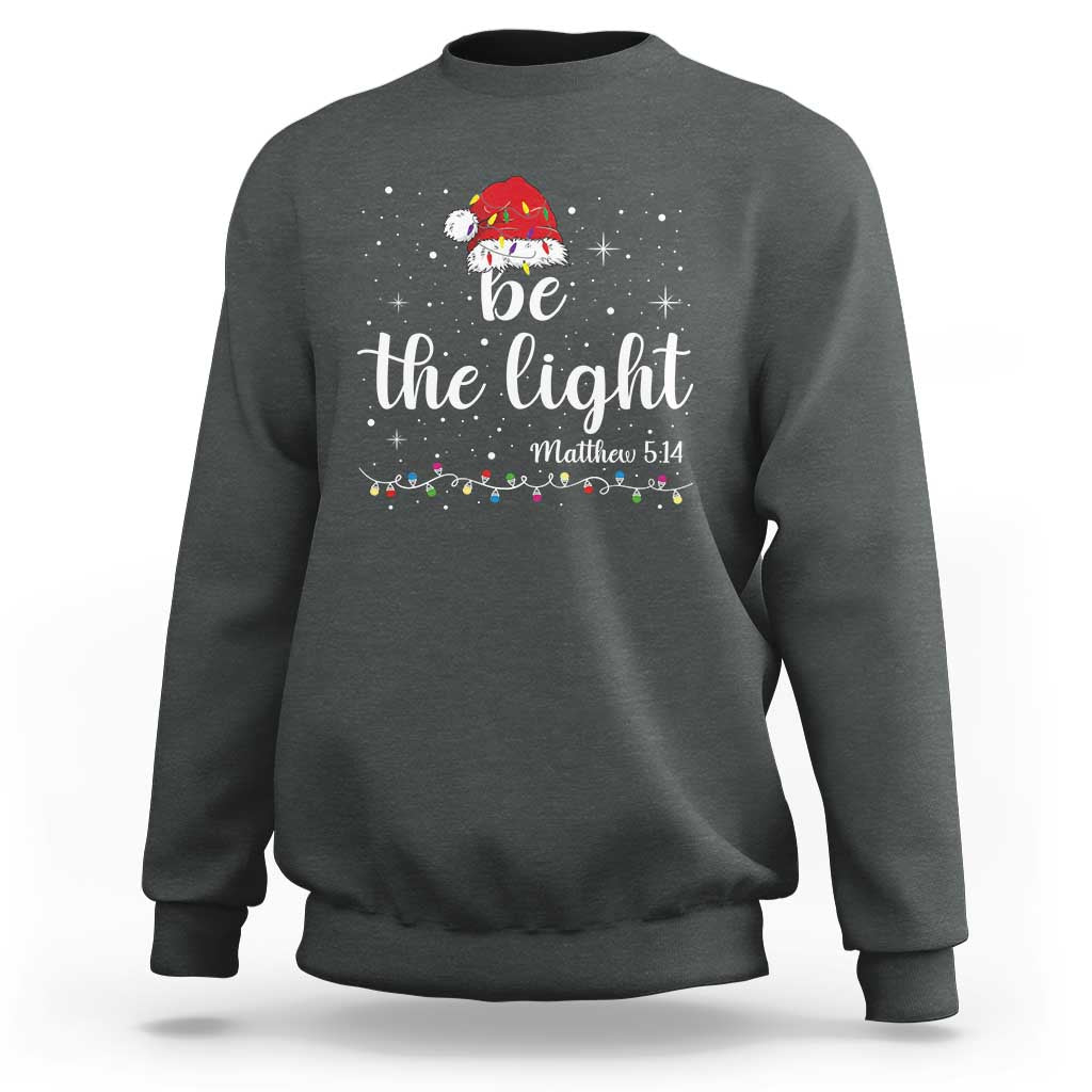 Be The Light Christmas Sweatshirt Christian Religious Bible Verse Santa Hat Pajama - Wonder Print Shop