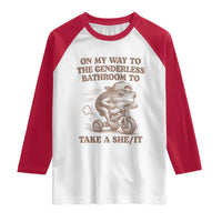 On My Way To The Genderless Bathroom To Take a She/It Raglan Shirt Funny Frog Graphic
