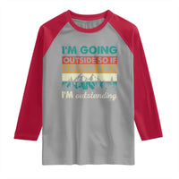 Funny I m Going Outside So If Anyone Asks I m Outstanding Raglan Shirt Hiking Camping - Wonder Print Shop