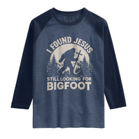 I Found Jesus Still Looking For Bigfoot Raglan Shirt Funny Christian Sasquatch Forest