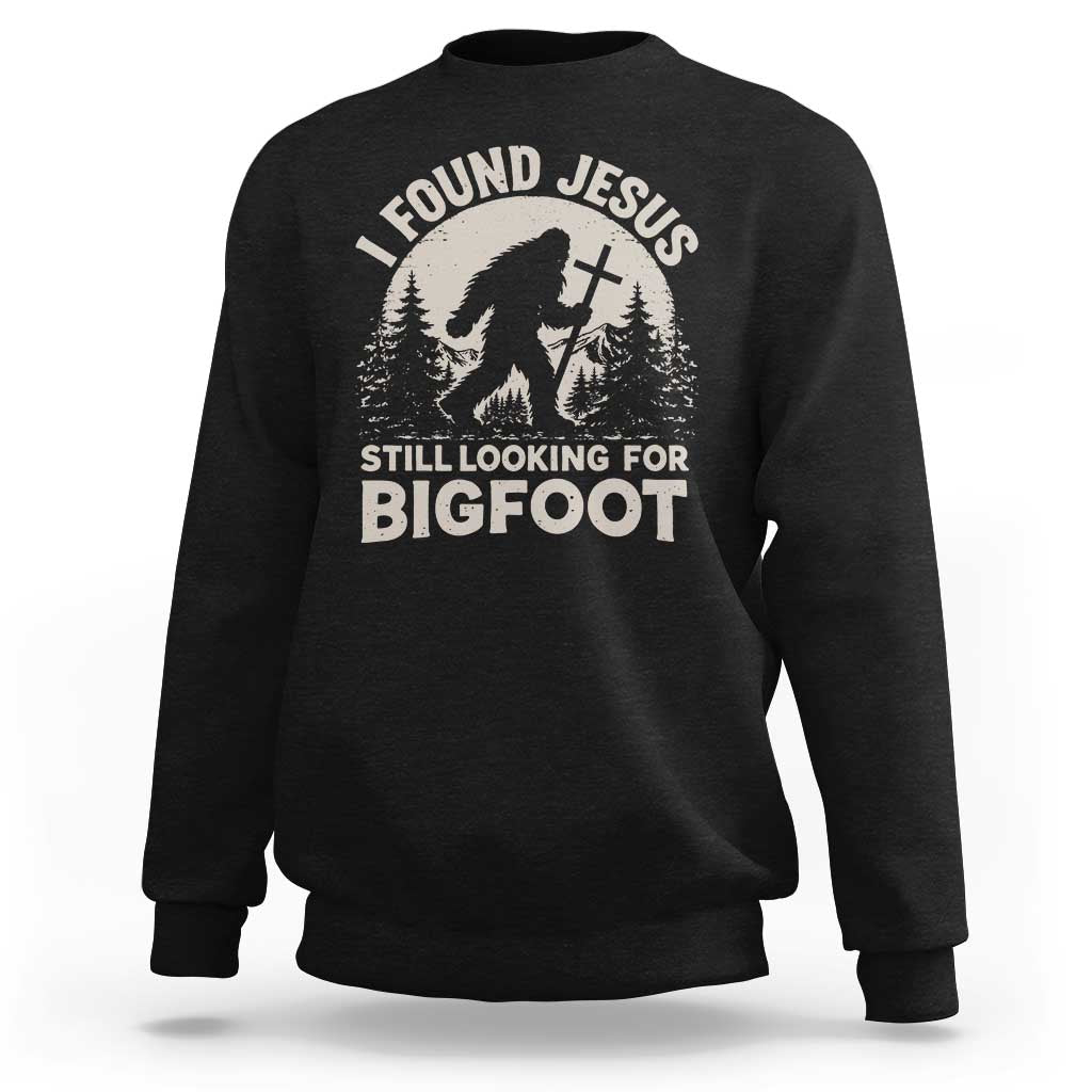 I Found Jesus Still Looking For Bigfoot Sweatshirt Funny Christian Sasquatch Forest