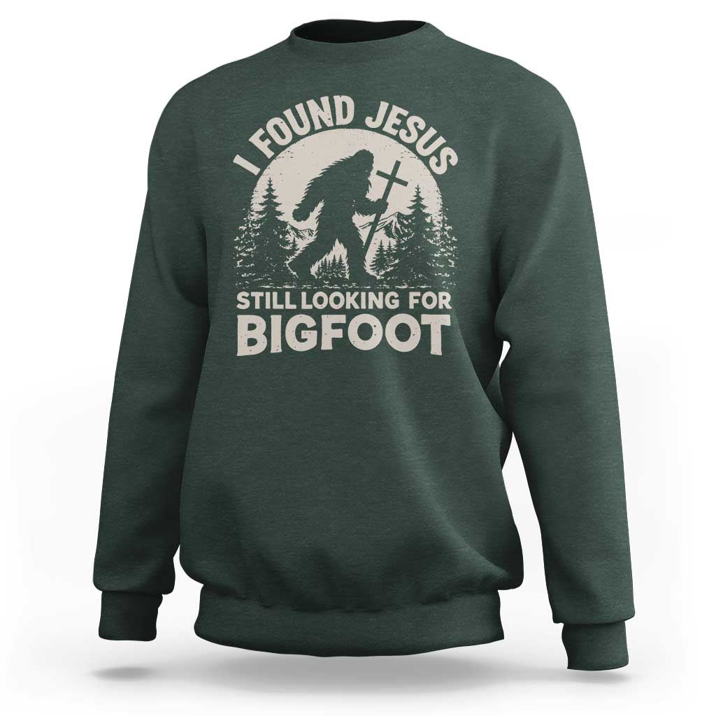 I Found Jesus Still Looking For Bigfoot Sweatshirt Funny Christian Sasquatch Forest