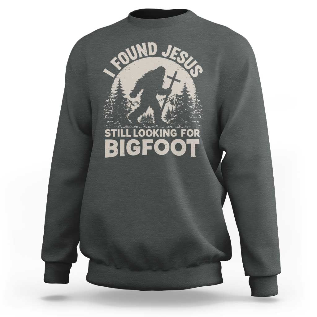 I Found Jesus Still Looking For Bigfoot Sweatshirt Funny Christian Sasquatch Forest