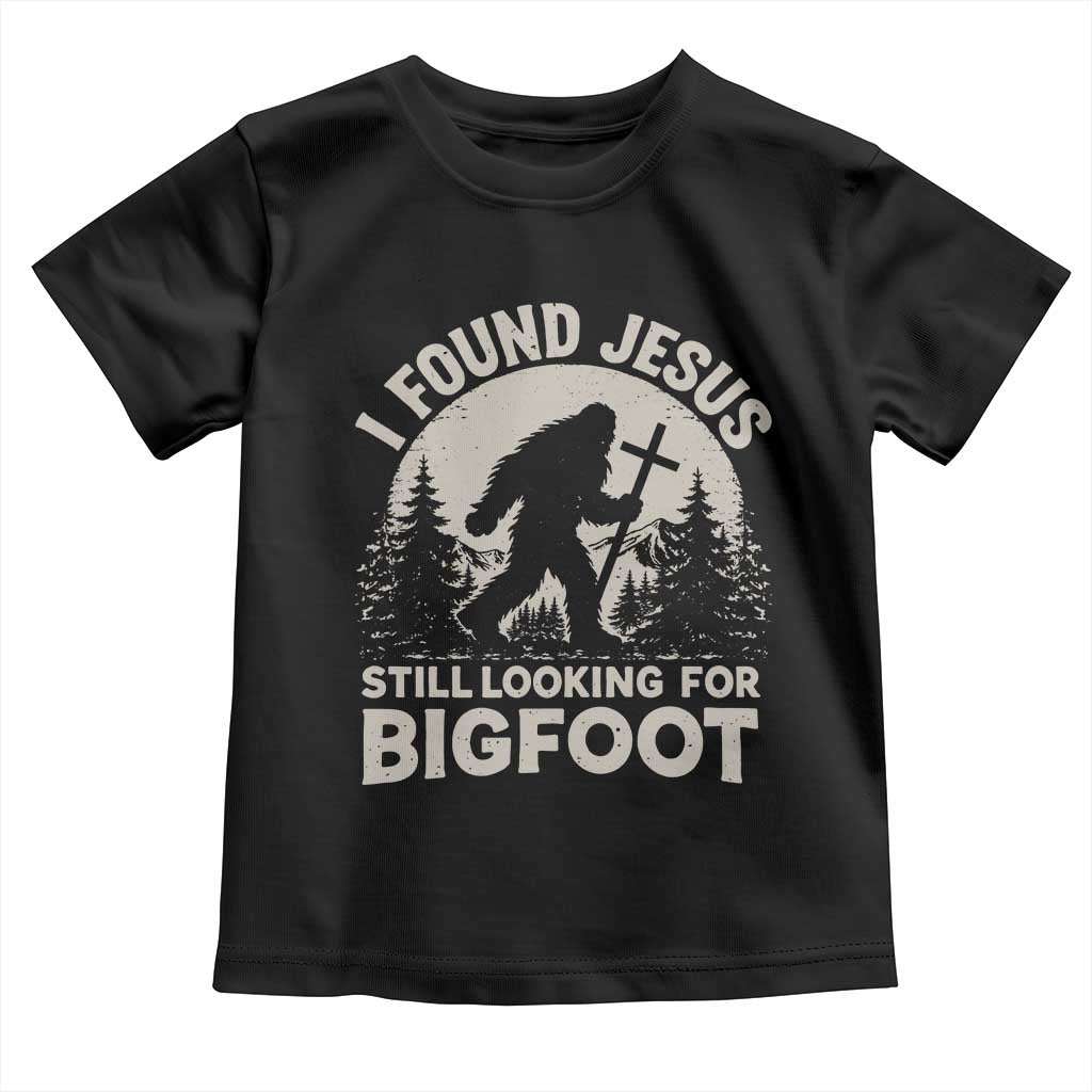 I Found Jesus Still Looking For Bigfoot Toddler T Shirt Funny Christian Sasquatch Forest