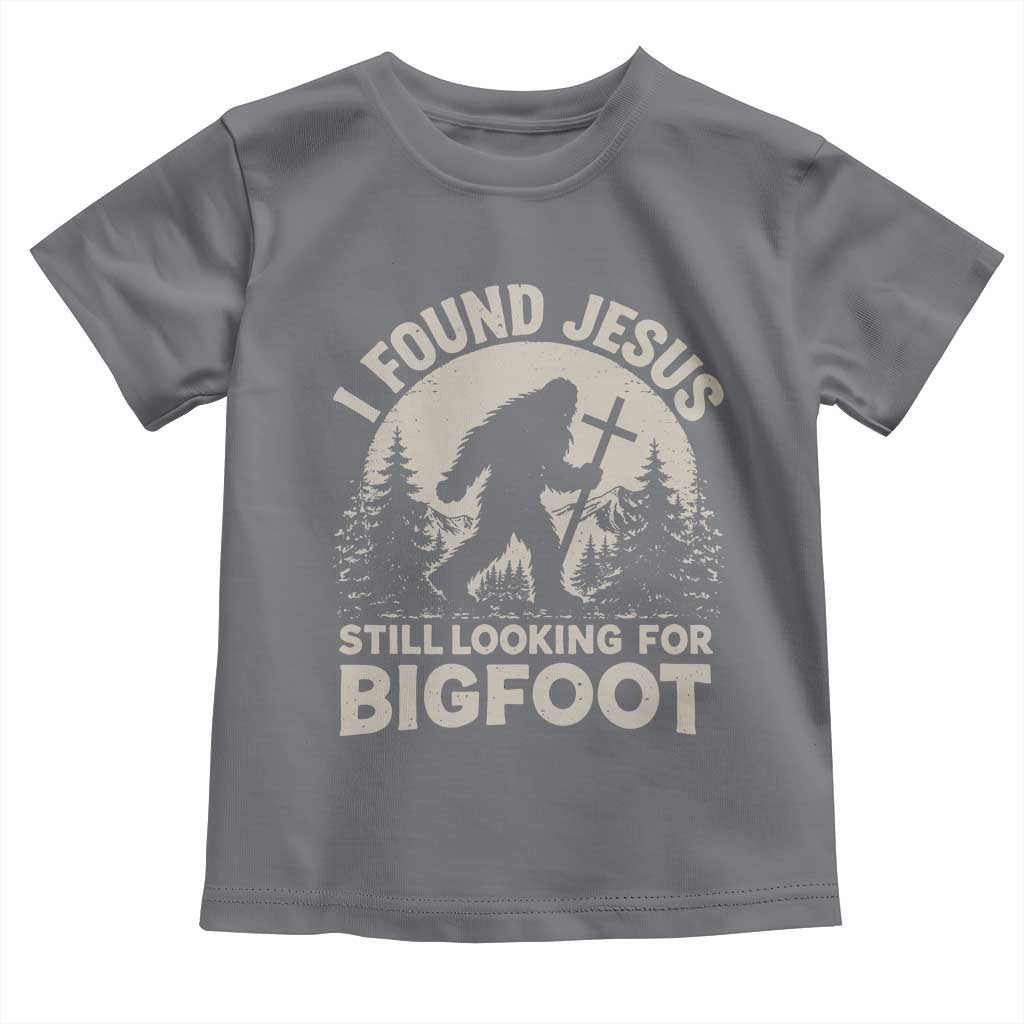 I Found Jesus Still Looking For Bigfoot Toddler T Shirt Funny Christian Sasquatch Forest