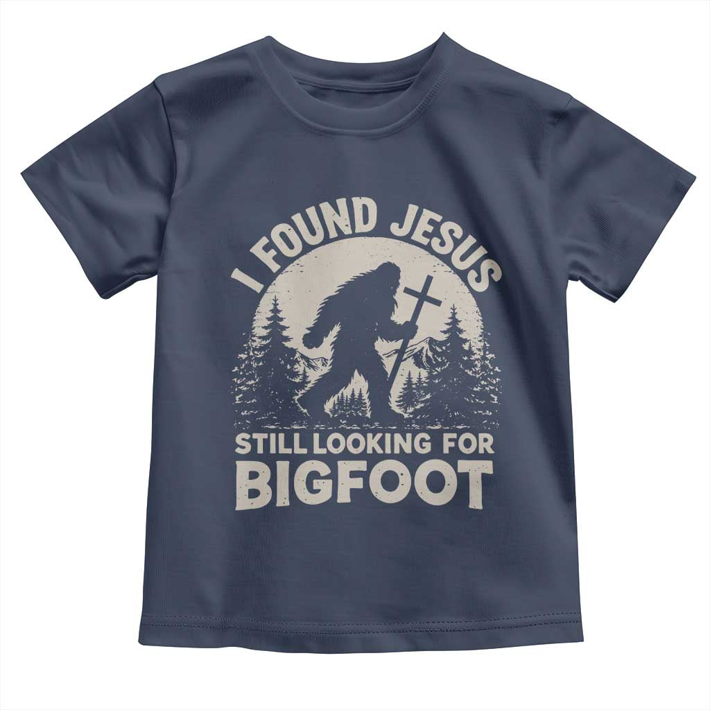 I Found Jesus Still Looking For Bigfoot Toddler T Shirt Funny Christian Sasquatch Forest