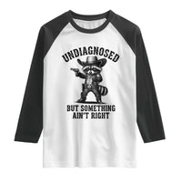 Undiagnosed But Something Ain't Right Raglan Shirt Funny Raccoon Cowboy
