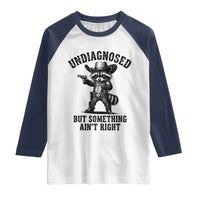 Undiagnosed But Something Ain't Right Raglan Shirt Funny Raccoon Cowboy