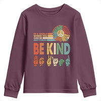 In A World Where You Can Be Anything Be Kind Youth Sweatshirt Sign Language Retro Peace Sign