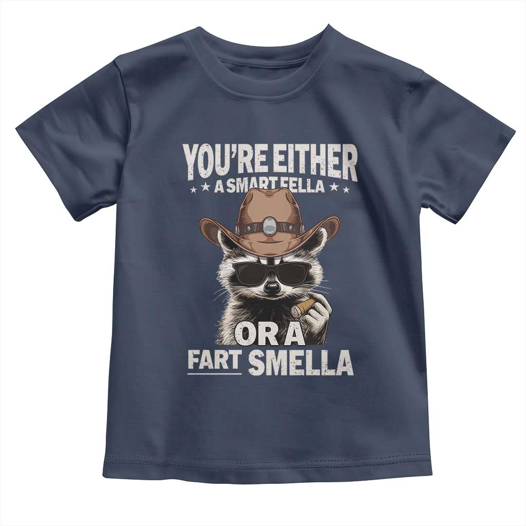 Funny You're Either A Smart Fella Or A Fart Smella Toddler T Shirt Cowboy Racoon