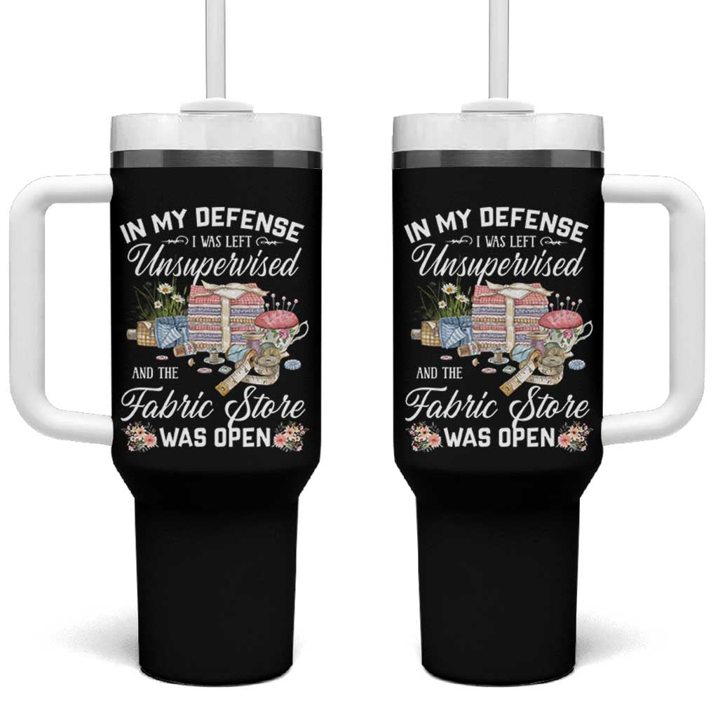 Funny Sewing Lover Tumbler With Handle In My Defense I Was Left Unsupervised And The Fabric Store Was Open - Wonder Print Shop