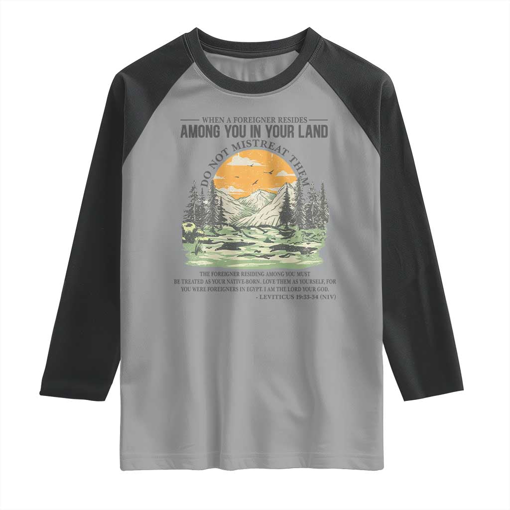 When A Foreigner Resides Among You In Your Land Do Not Mistreat Them Raglan Shirt Bible Verse - Wonder Print Shop