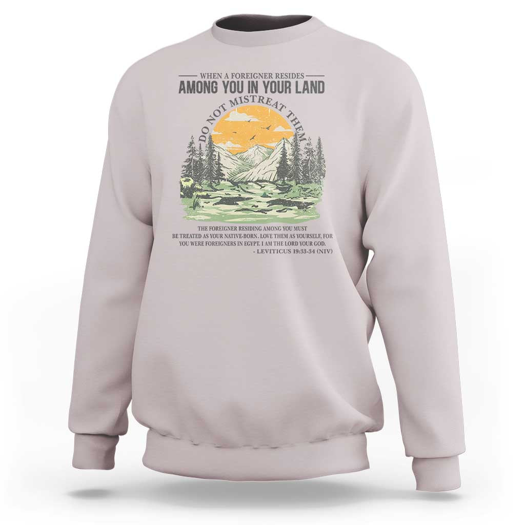 When A Foreigner Resides Among You In Your Land Do Not Mistreat Them Sweatshirt Bible Verse - Wonder Print Shop