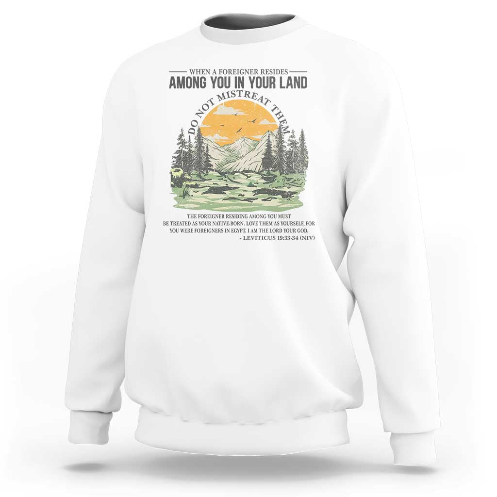 When A Foreigner Resides Among You In Your Land Do Not Mistreat Them Sweatshirt Bible Verse - Wonder Print Shop