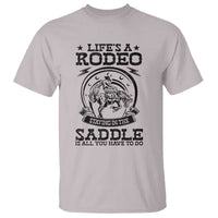 Western Cowboy T Shirt Life's A Rodeo Staying In The Saddle Is All You Have To Do - Wonder Print Shop