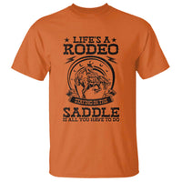 Western Cowboy T Shirt Life's A Rodeo Staying In The Saddle Is All You Have To Do - Wonder Print Shop