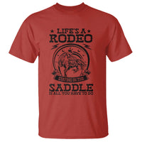 Western Cowboy T Shirt Life's A Rodeo Staying In The Saddle Is All You Have To Do - Wonder Print Shop