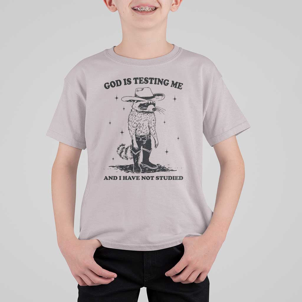 Funny God Is Testing Me And I Have Not Studied T Shirt For Kid Cowboy Racoon
