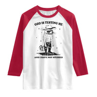 Funny God Is Testing Me And I Have Not Studied Raglan Shirt Cowboy Racoon