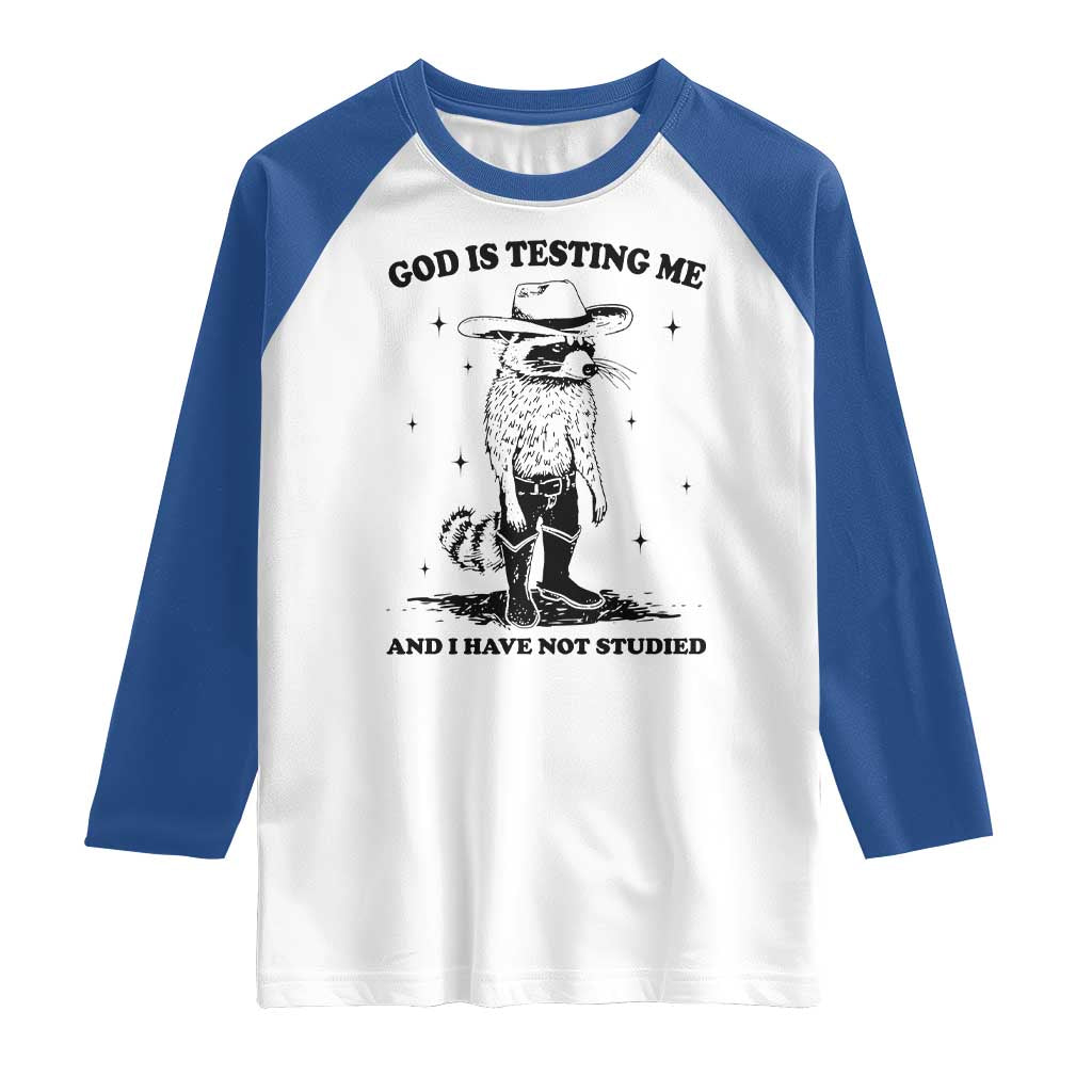 Funny God Is Testing Me And I Have Not Studied Raglan Shirt Cowboy Racoon