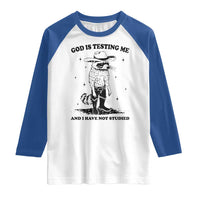 Funny God Is Testing Me And I Have Not Studied Raglan Shirt Cowboy Racoon