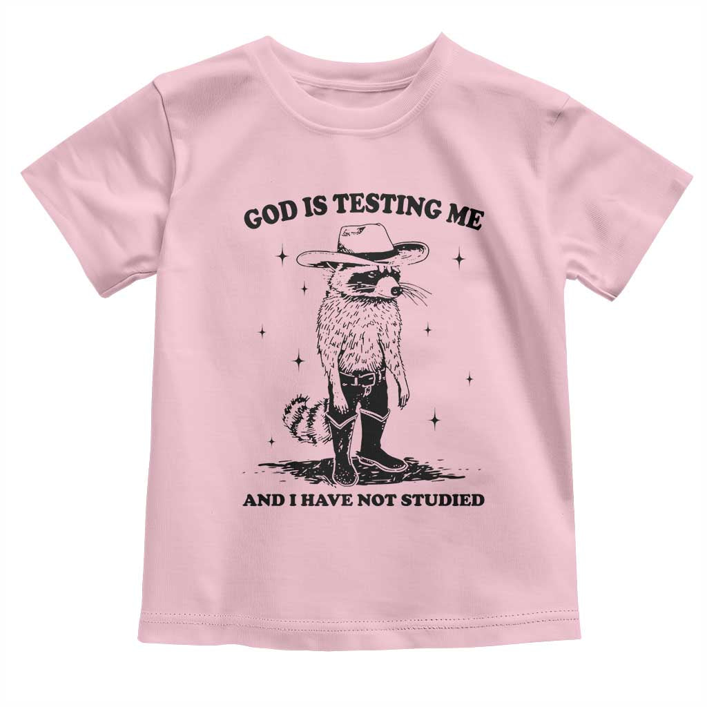 Funny God Is Testing Me And I Have Not Studied Toddler T Shirt Cowboy Racoon