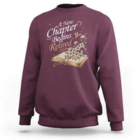 A New Chapter Begins Retired 2026 Sweatshirt Retired Teacher Floral Book - Wonder Print Shop