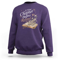 A New Chapter Begins Retired 2026 Sweatshirt Retired Teacher Floral Book - Wonder Print Shop