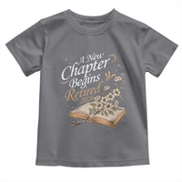 A New Chapter Begins Retired 2026 Toddler T Shirt Retired Teacher Floral Book - Wonder Print Shop