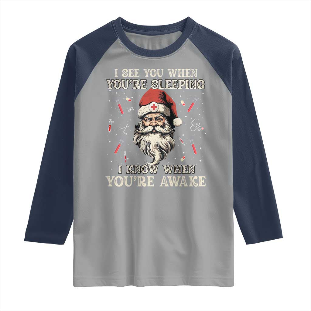 Funny Christmas Santa Doctor Medical Raglan Shirt I See You When You're Sleeping I Know When You're Awake - Wonder Print Shop