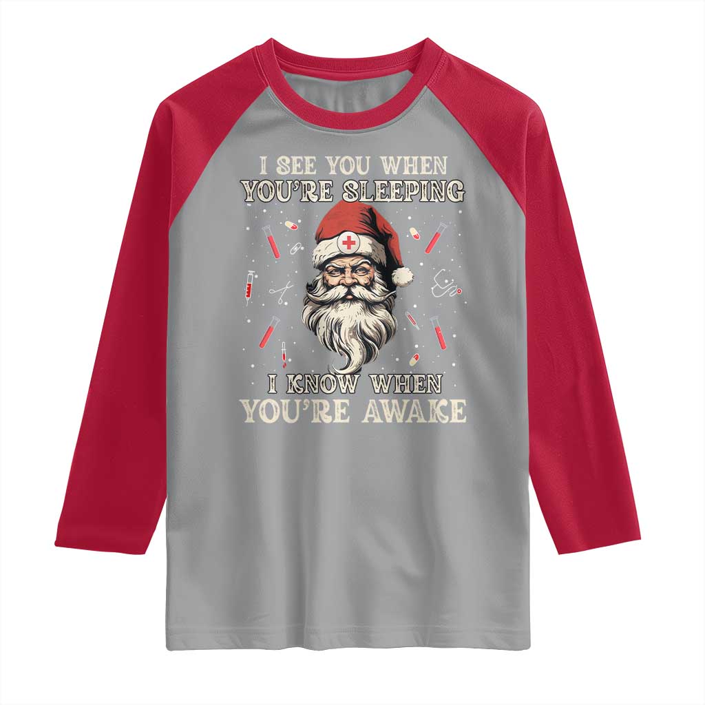Funny Christmas Santa Doctor Medical Raglan Shirt I See You When You're Sleeping I Know When You're Awake - Wonder Print Shop