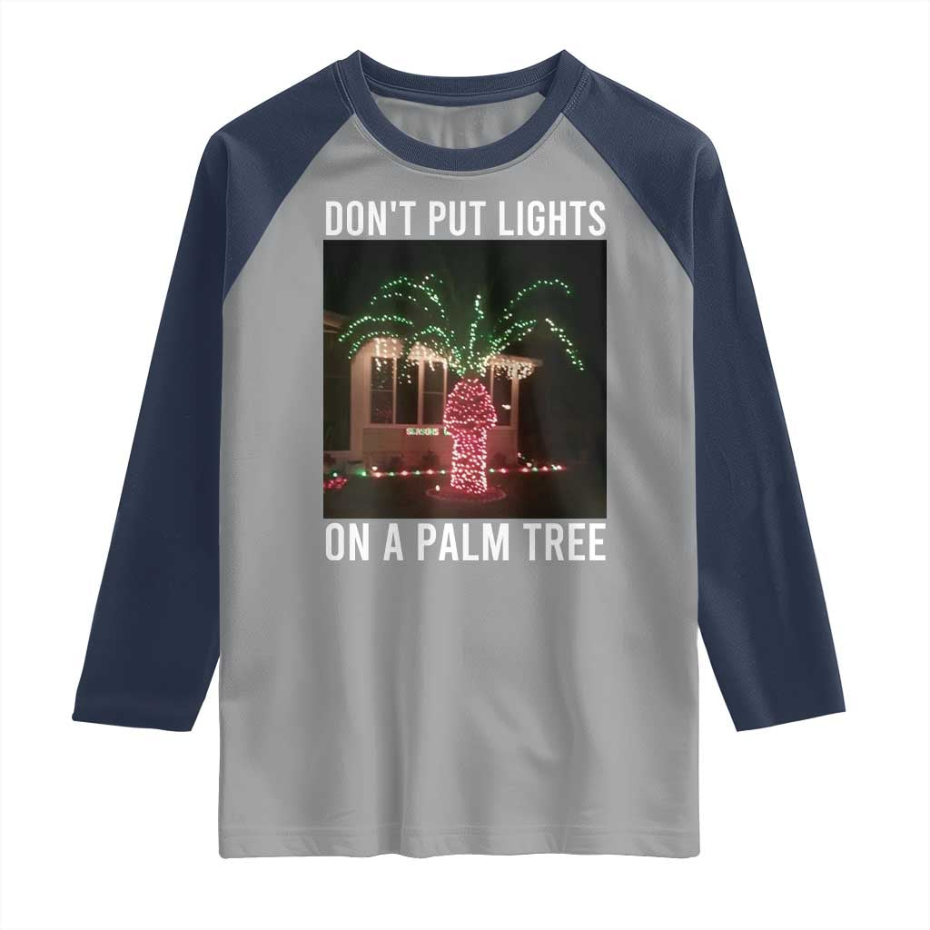 Funny Christmas Dont Put Lights On A Palm Tree Raglan Shirt Xmas Lights Palm Tree Meme - Wonder Print Shop