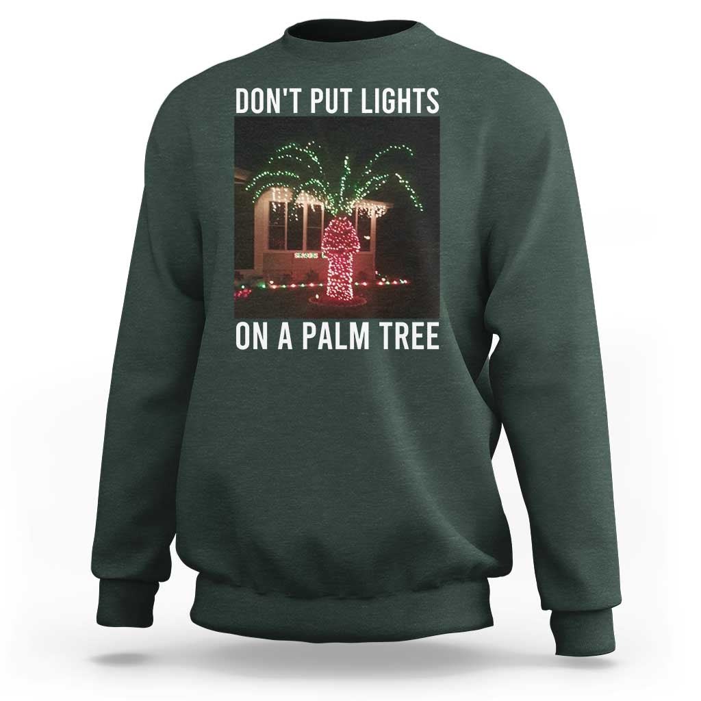 Funny Christmas Dont Put Lights On A Palm Tree Sweatshirt Xmas Lights Palm Tree Meme - Wonder Print Shop
